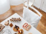 A collection of wooden puzzle toys arranged on a modern table in an indoor setting, perfect for encouraging intellectual play.